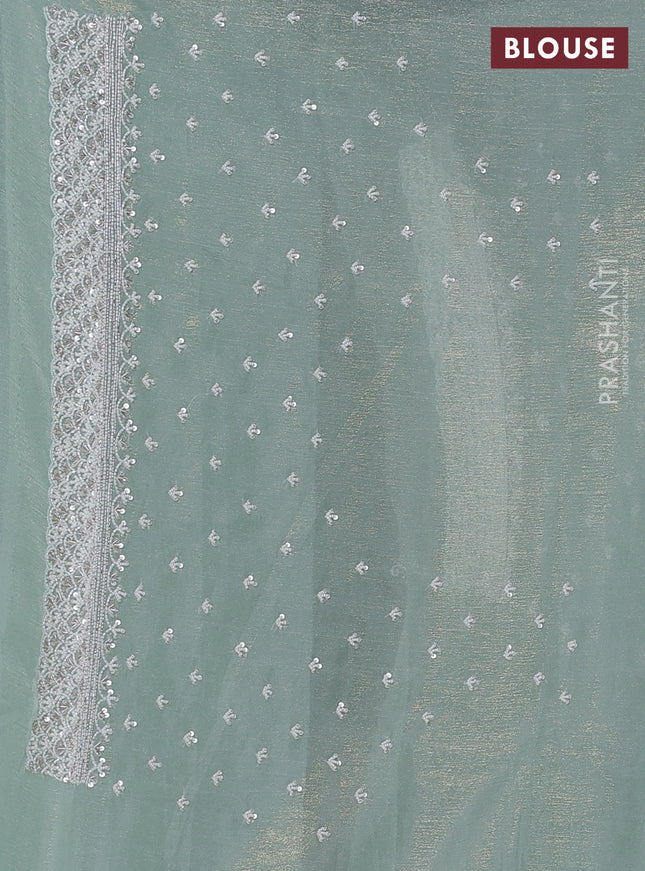Crush tissue saree pastel green with beaded work and sequin & cut beaded work border