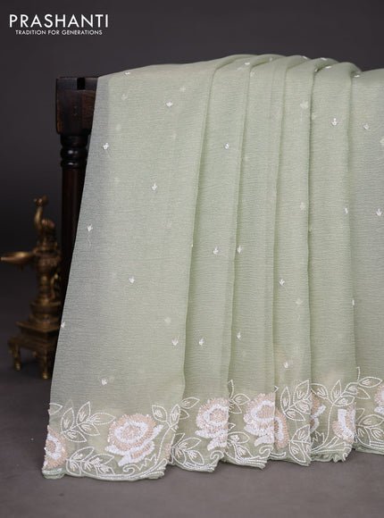 Crush tissue saree pista green with beaded work and sequin & cut beaded work border