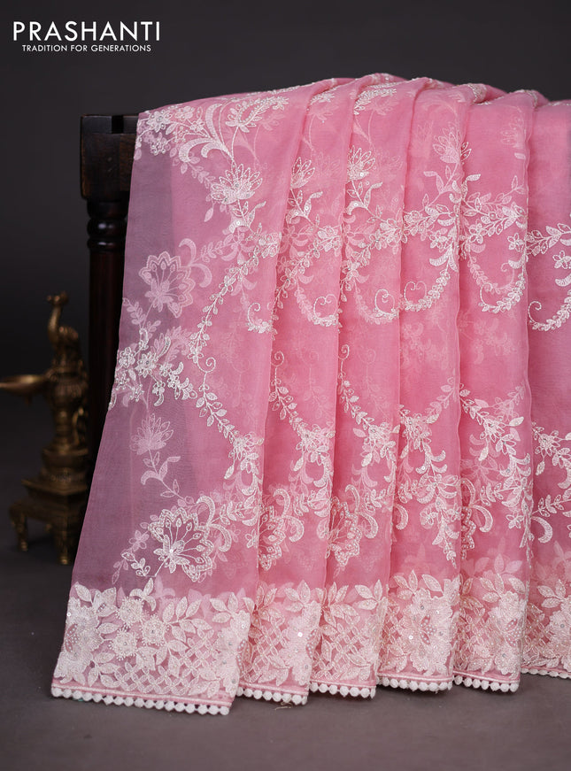 Organza silk saree light pink with allover floral embroidery sequin work and crocia lace work border