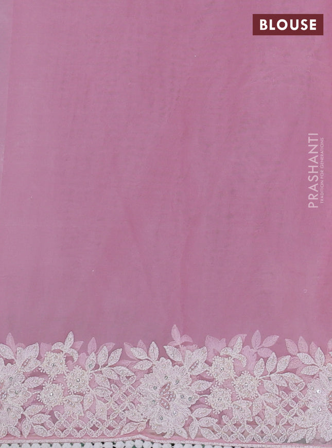 Organza silk saree light pink with allover floral embroidery sequin work and crocia lace work border