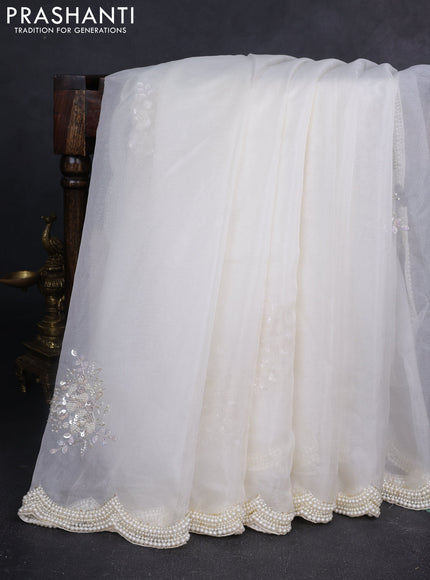 Organza silk saree off white with allover floral embroidery sequin work and beaded work border