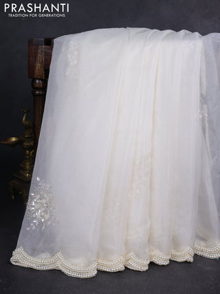 Organza silk saree off white with allover floral embroidery sequin work and beaded work border