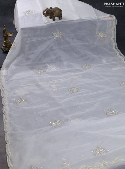 Organza silk saree off white with allover floral embroidery sequin work and beaded work border