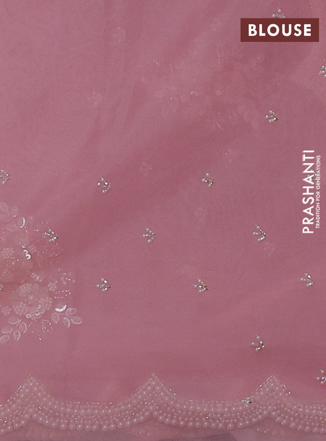 Organza silk saree peach pink with allover floral embroidery sequin work and beaded work border