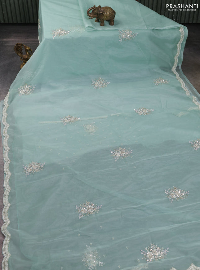 Organza silk saree pastel blue with allover floral embroidery sequin work and beaded work border