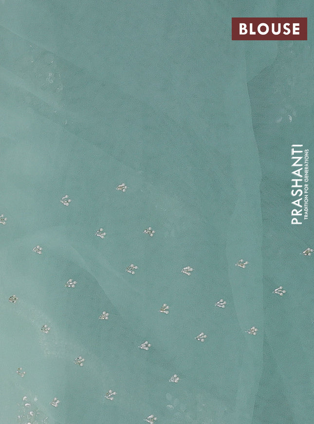 Organza silk saree pastel blue with allover floral embroidery sequin work and beaded work border