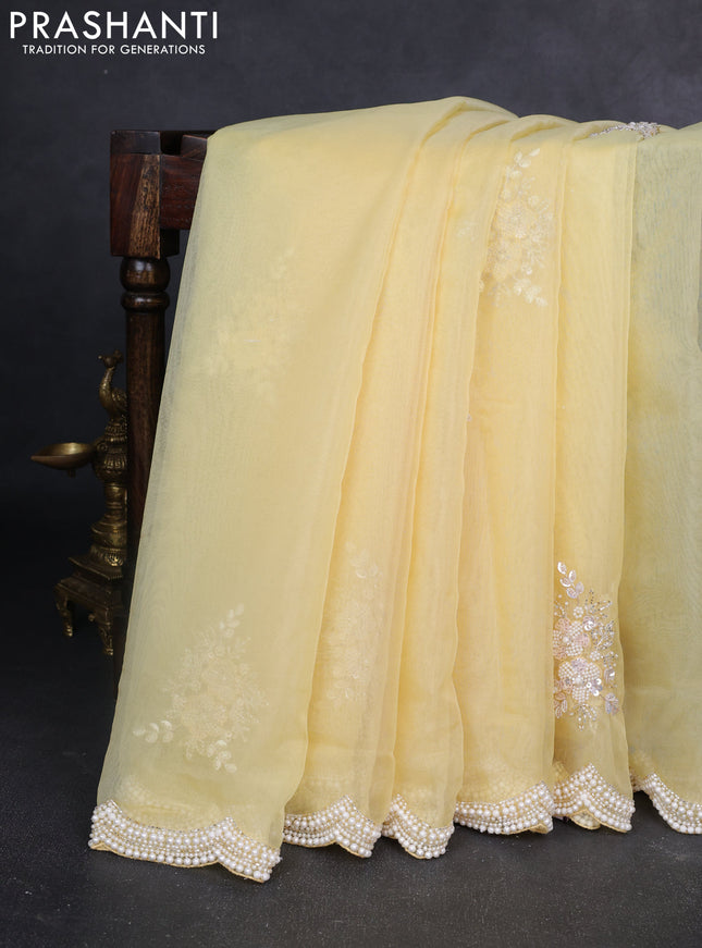 Organza silk saree yellow with allover floral embroidery sequin work and beaded work border