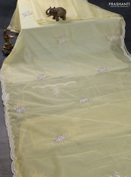 Organza silk saree yellow with allover floral embroidery sequin work and beaded work border
