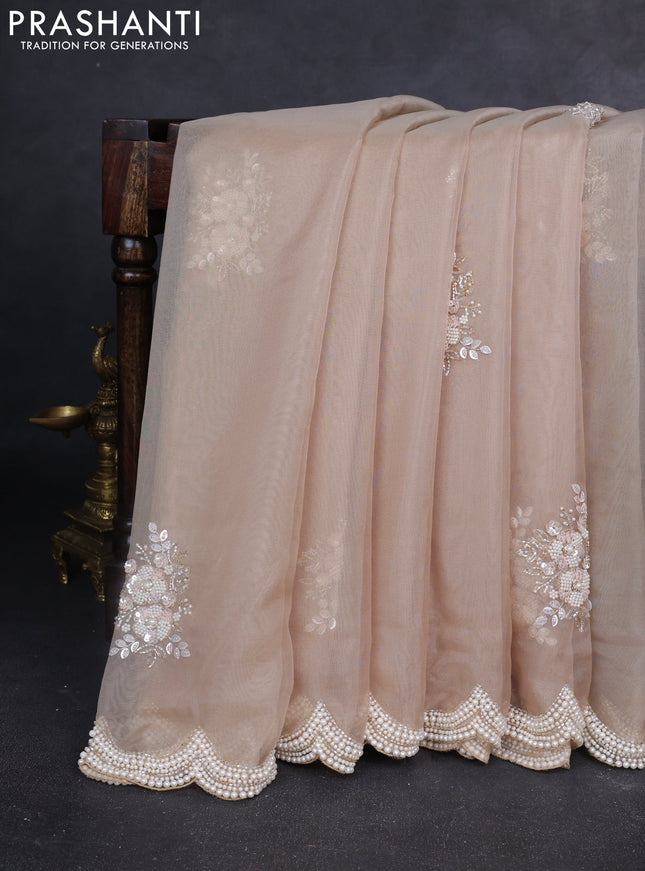 Organza silk saree sandal with allover floral embroidery sequin work and beaded work border