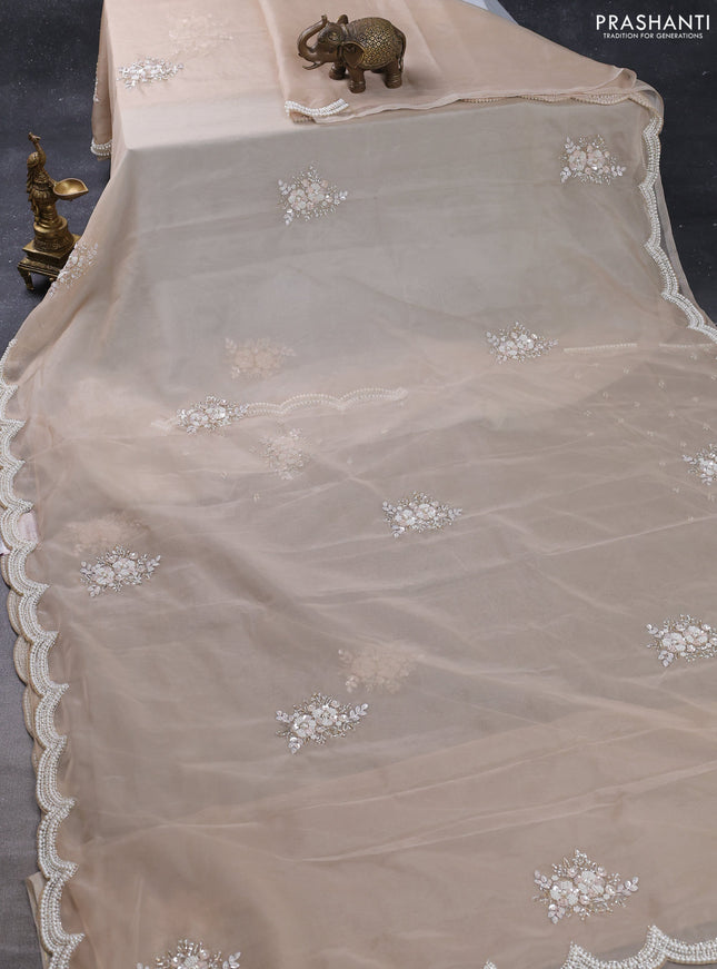 Organza silk saree sandal with allover floral embroidery sequin work and beaded work border