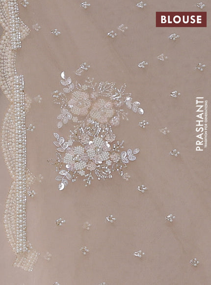 Organza silk saree sandal with allover floral embroidery sequin work and beaded work border