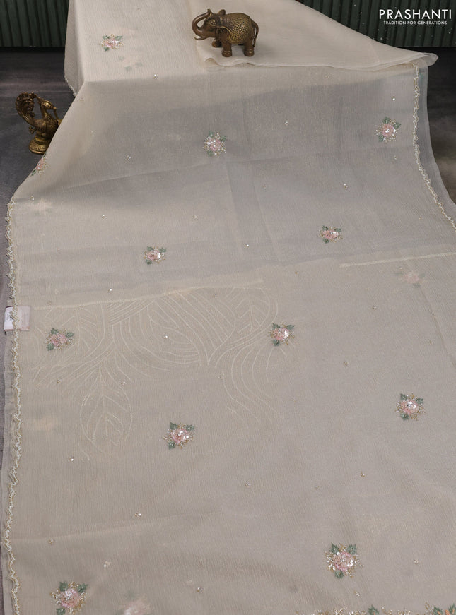 Crush tissue saree cream with allover floral embroidery sequin work