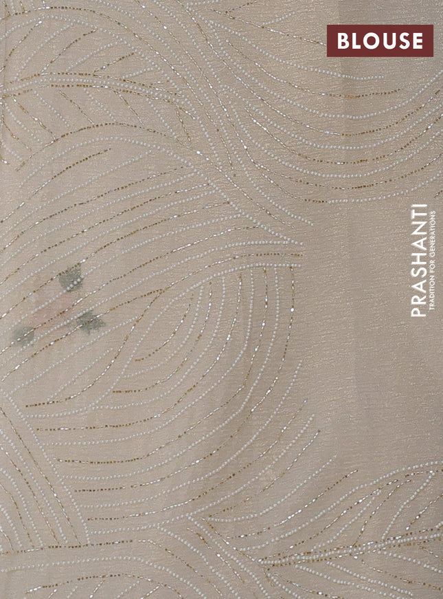 Crush tissue saree cream with allover floral embroidery sequin work