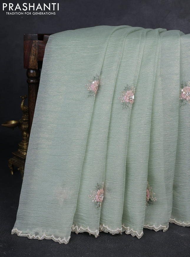 Crush tissue saree pastel green with allover floral embroidery sequin work