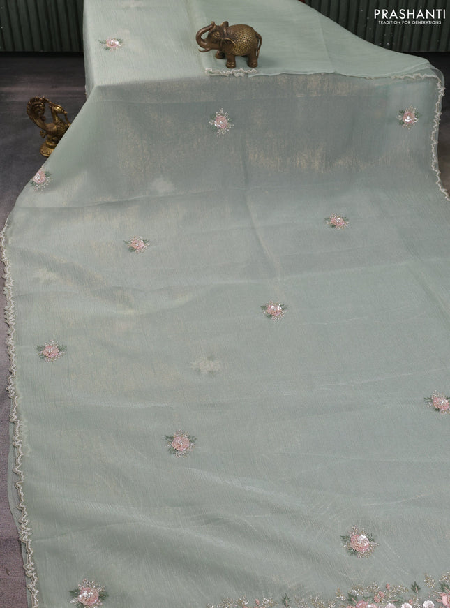Crush tissue saree pastel green with allover floral embroidery sequin work