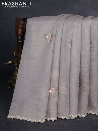 Crush tissue saree grey with allover floral embroidery sequin work