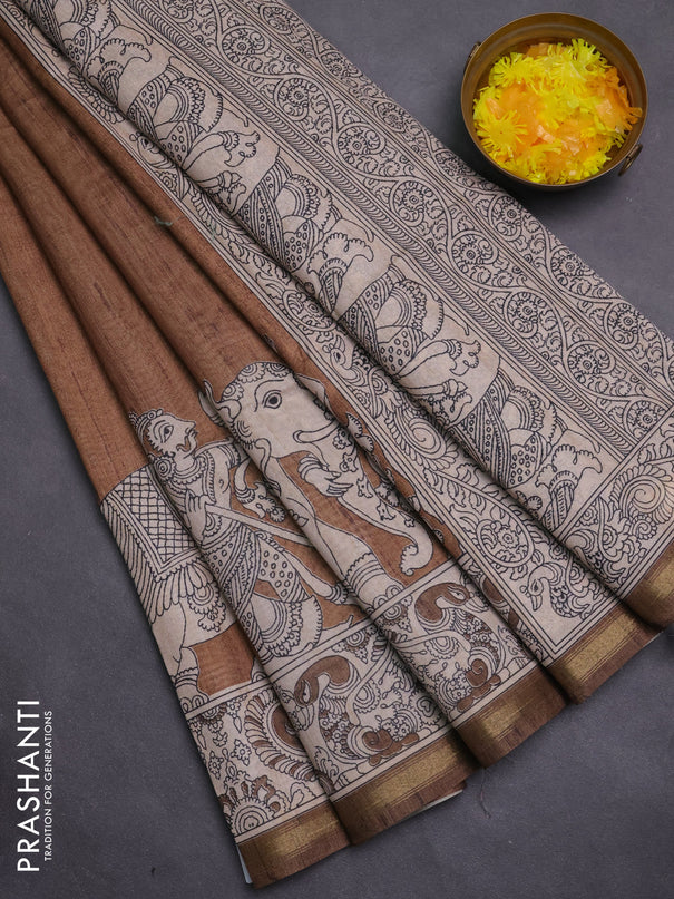 Art linen saree dark mustard and beige with plain body and kalamkari printed pallu