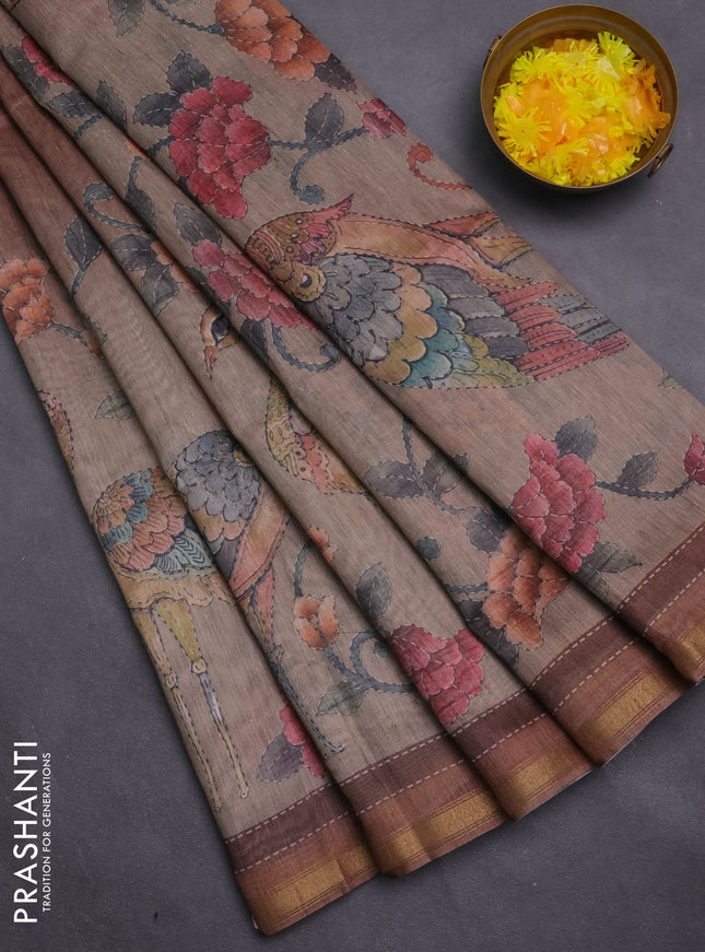 Art linen saree brown and pastel green with plain body and printed pallu