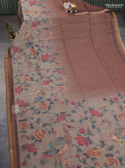 Art linen saree brown and pastel green with plain body and printed pallu