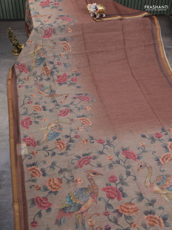 Art linen saree brown and pastel green with plain body and printed pallu