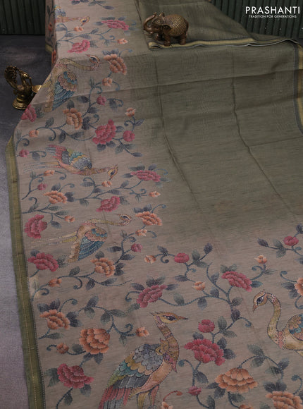 Art linen saree sap green and pastel grey with plain body and printed pallu