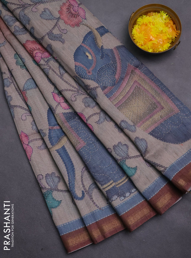 Art linen saree brown and pastel grey with allover kalamkari prints and zari woven border