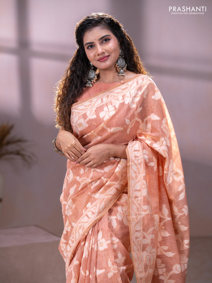 Linen cotton saree peach shade with allover jamdhani weaves