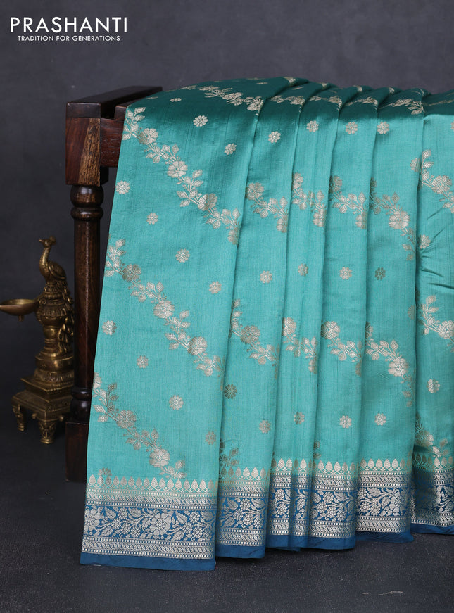 Chiniya silk saree teal blue shade and peacock blue with allover zari weaves and zari woven border