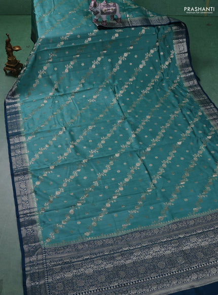 Chiniya silk saree teal blue shade and peacock blue with allover zari weaves and zari woven border
