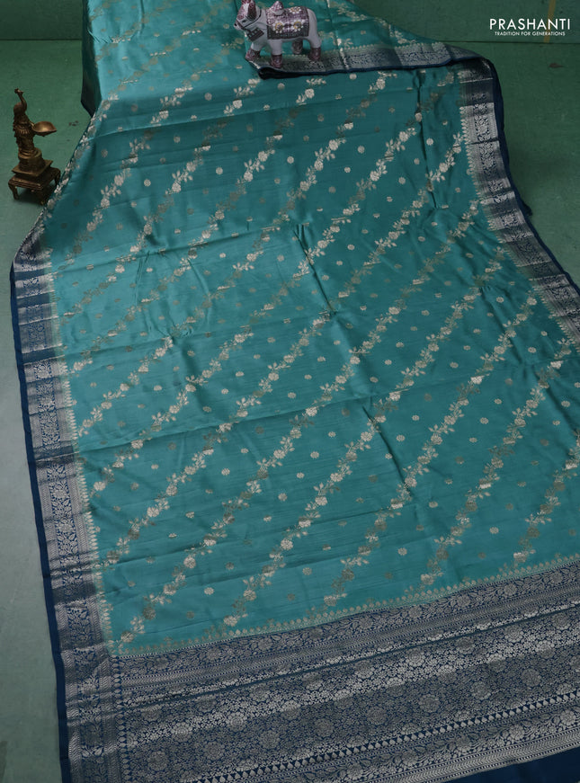 Chiniya silk saree teal blue shade and peacock blue with allover zari weaves and zari woven border