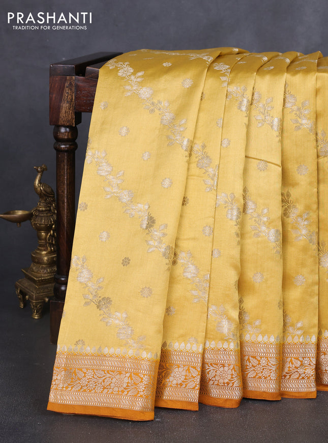 Chiniya silk saree mustard shade and dark mustard with allover zari weaves and zari woven border