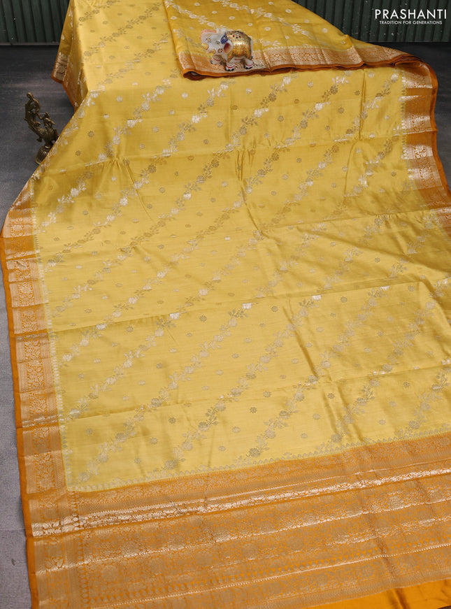 Chiniya silk saree mustard shade and dark mustard with allover zari weaves and zari woven border