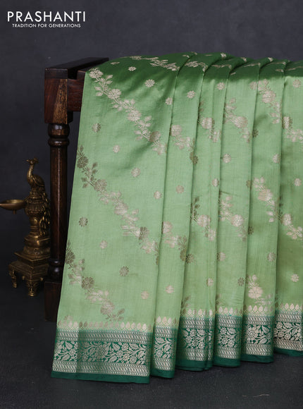 Chiniya silk saree pastel green and dark green with allover zari weaves and zari woven border