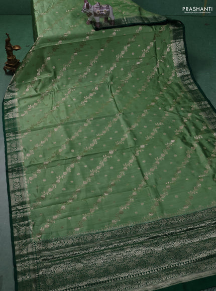 Chiniya silk saree pastel green and dark green with allover zari weaves and zari woven border