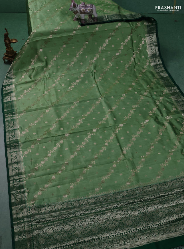 Chiniya silk saree pastel green and dark green with allover zari weaves and zari woven border