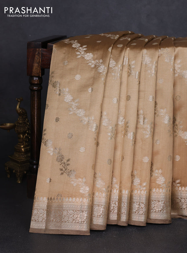 Chiniya silk saree sandal and pastel brown with allover zari weaves and zari woven border