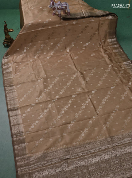 Chiniya silk saree sandal and pastel brown with allover zari weaves and zari woven border