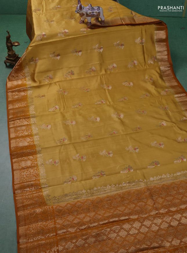 Chiniya silk saree mustard yellow and dark mustard with floral zari woven buttas and zari woven border