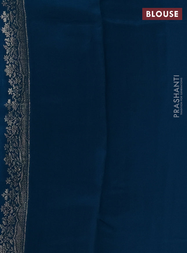 Chiniya silk saree teal blue and peacock blue with floral zari woven buttas and zari woven border