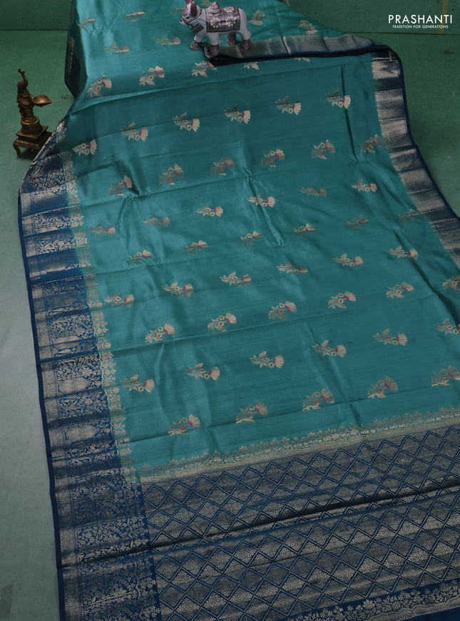 Chiniya silk saree teal green shade and peacock blue with floral zari woven buttas and zari woven border
