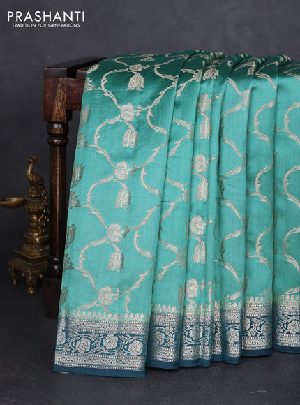 Chiniya silk saree teal shade and peacock blue with allover floral zari weaves and zari woven border