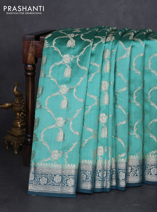 Chiniya silk saree teal shade and peacock blue with allover floral zari weaves and zari woven border