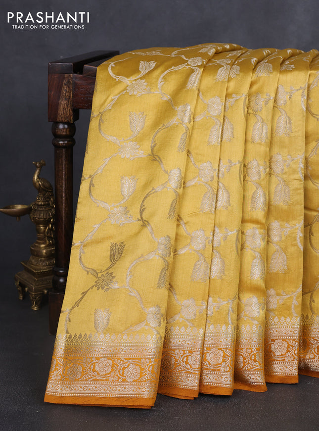 Chiniya silk saree mustard shade and dark mustard with allover floral zari weaves and zari woven border