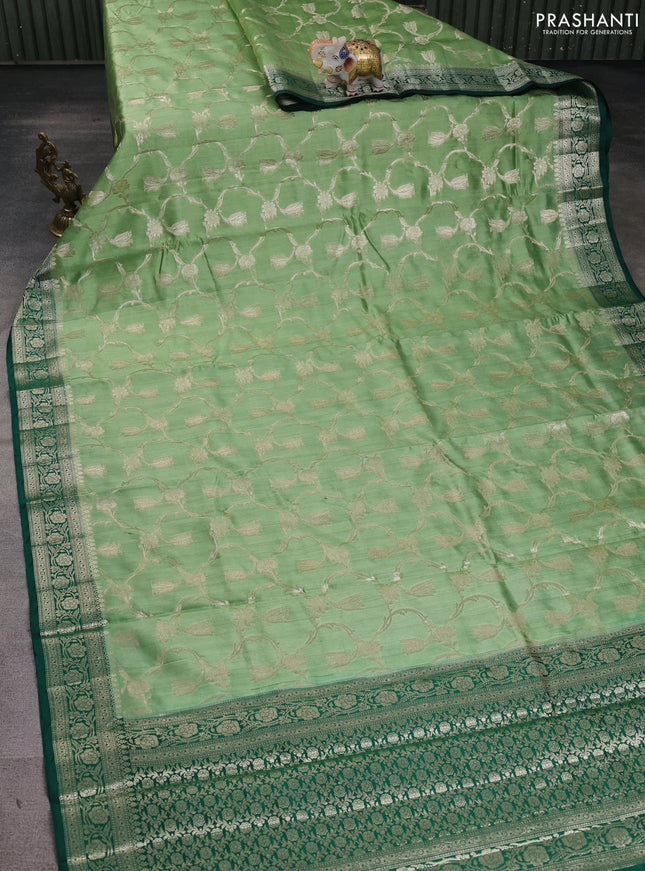 Chiniya silk saree pastel green and dark green with allover floral zari weaves and zari woven border