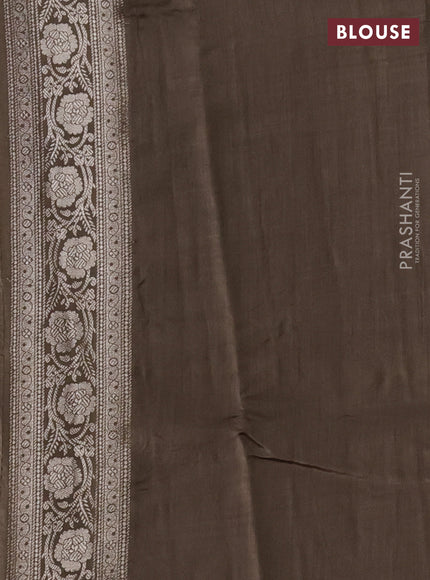 Chiniya silk saree sandal and brown shade with allover floral zari weaves and zari woven border