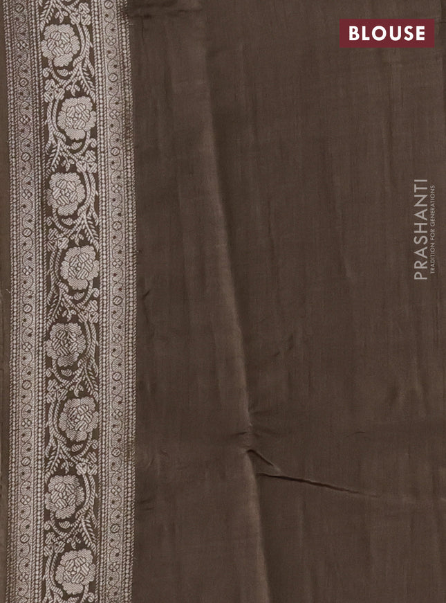 Chiniya silk saree sandal and brown shade with allover floral zari weaves and zari woven border