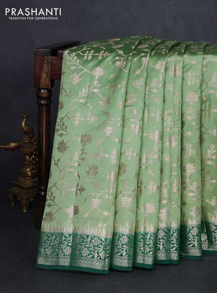 Chiniya silk saree pastel green and dark green with allover zari weaves and zari woven border