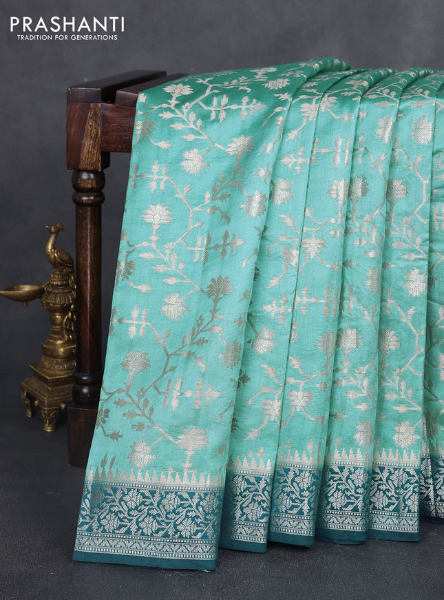 Chiniya silk saree teal blue shade and peacock blue with allover zari weaves and zari woven border