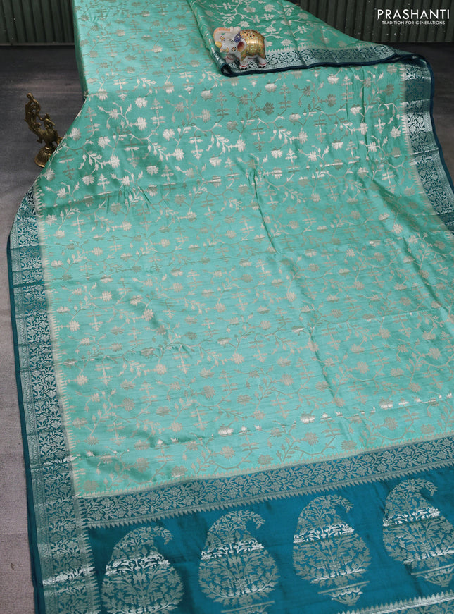 Chiniya silk saree teal blue shade and peacock blue with allover zari weaves and zari woven border