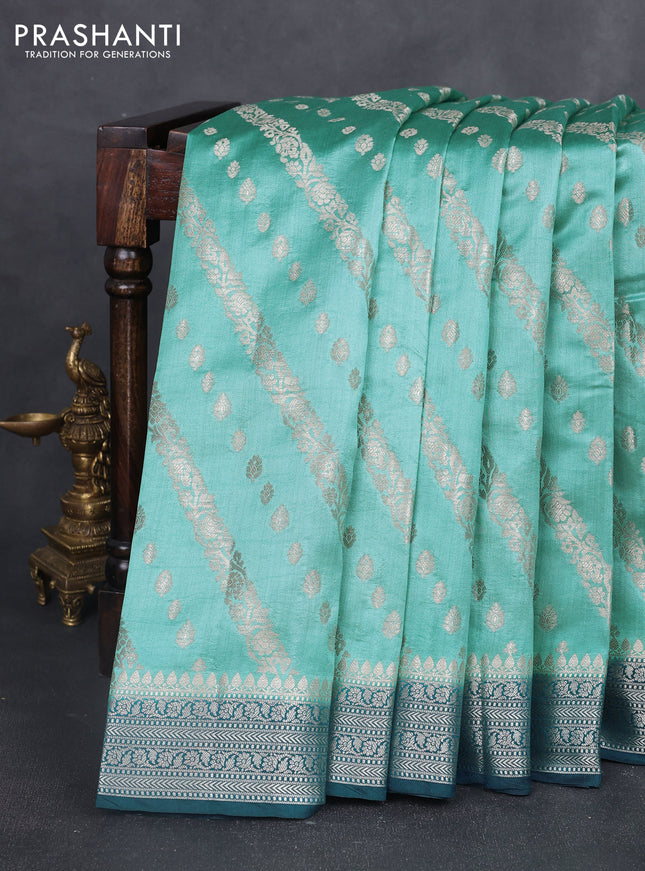 Chiniya silk saree teal blue and peacock blue with allover zari weaves and zari woven border